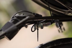 Arduino and battery pack attached to the bike rack